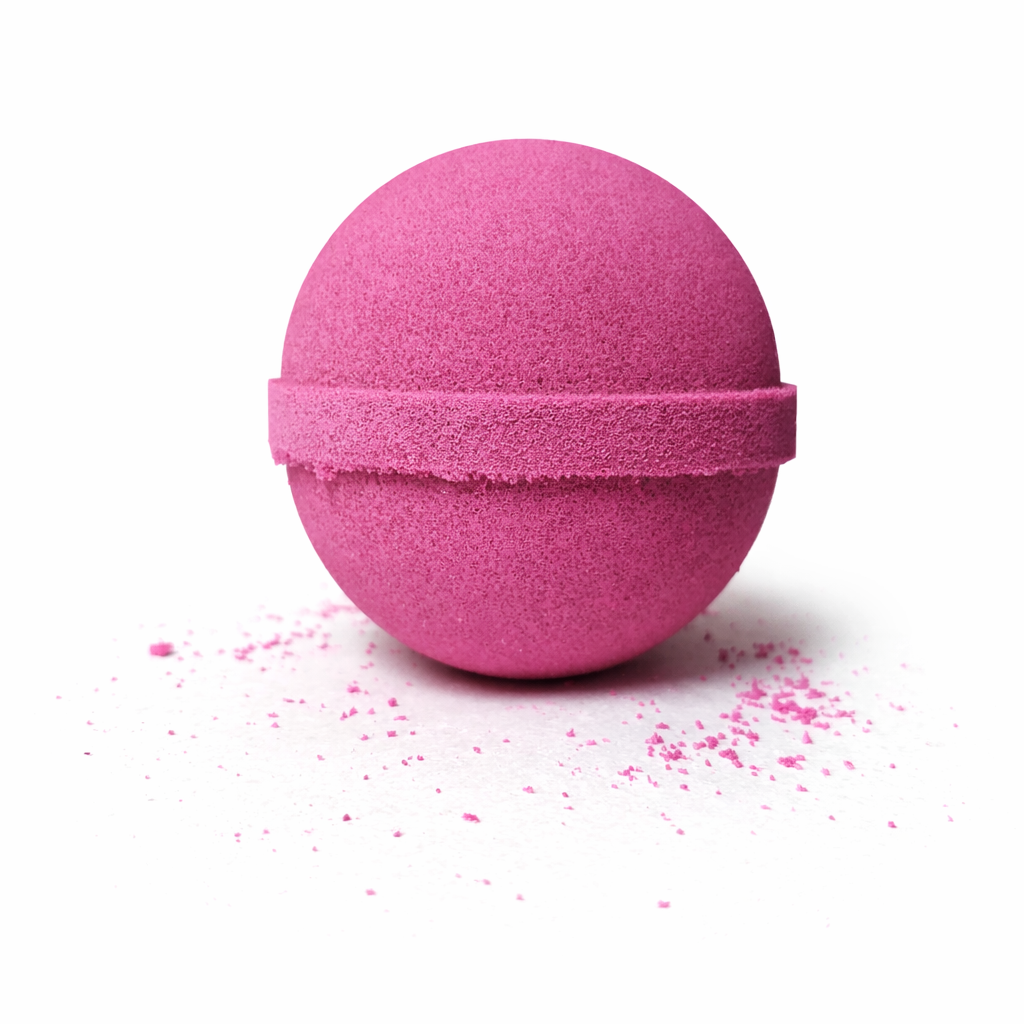 Pink bath bomb on a white background