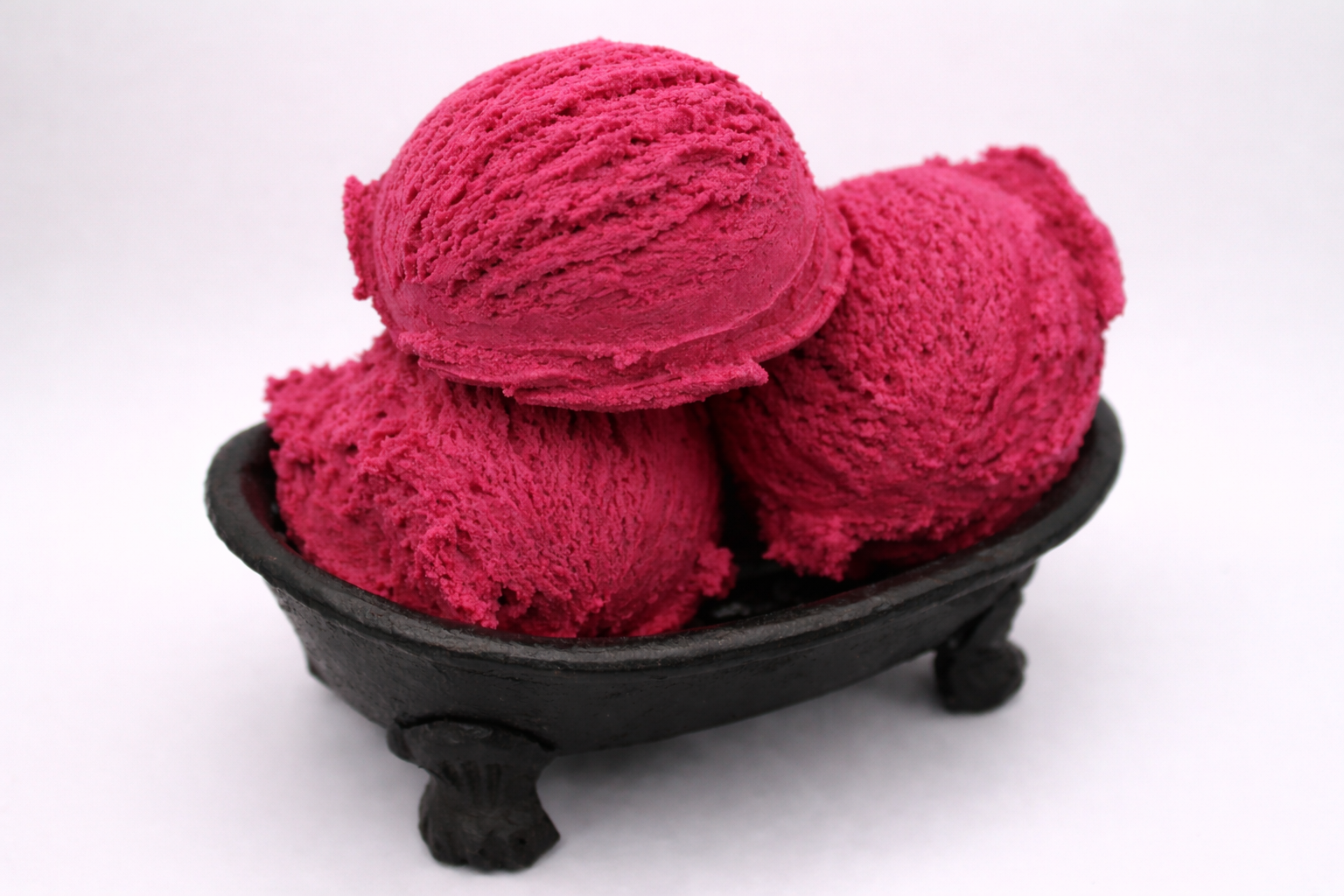 Three Bubble Scoops in a Black Dish 