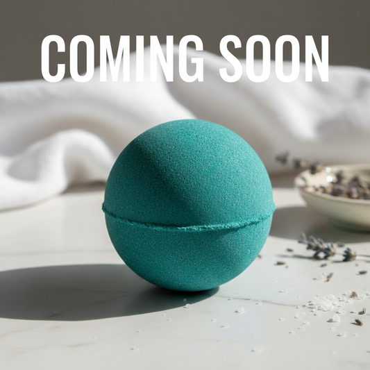 teal bath bomb with saying 'coming soon'